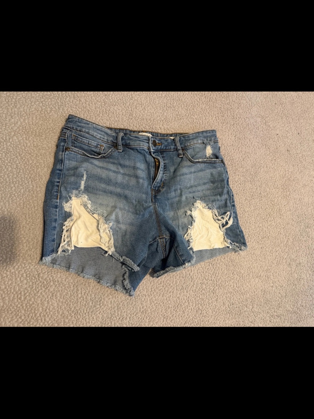 Distressed Light Blue Denim Shorts with Frayed Hem